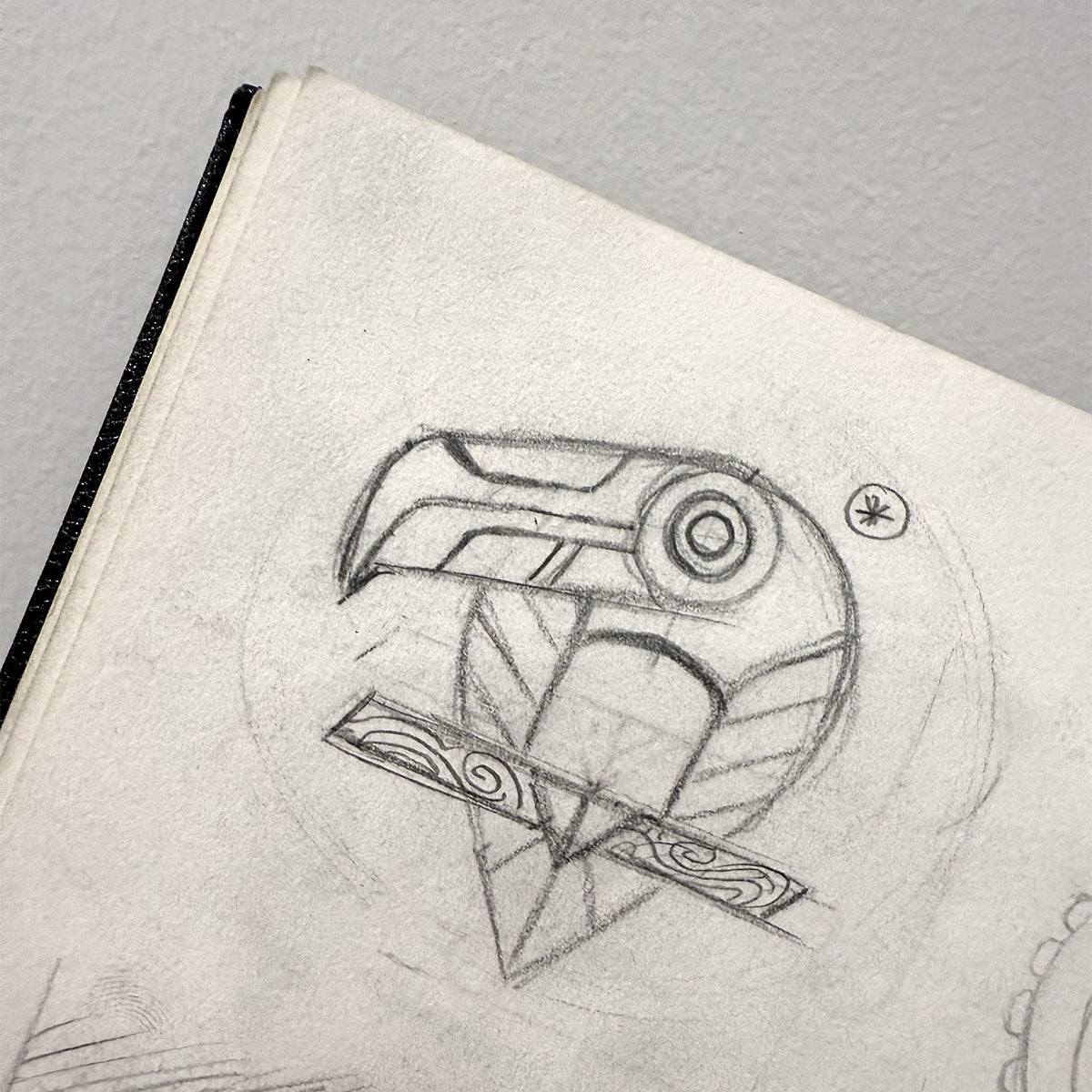Original drawing of geometric toucan in sketchbook