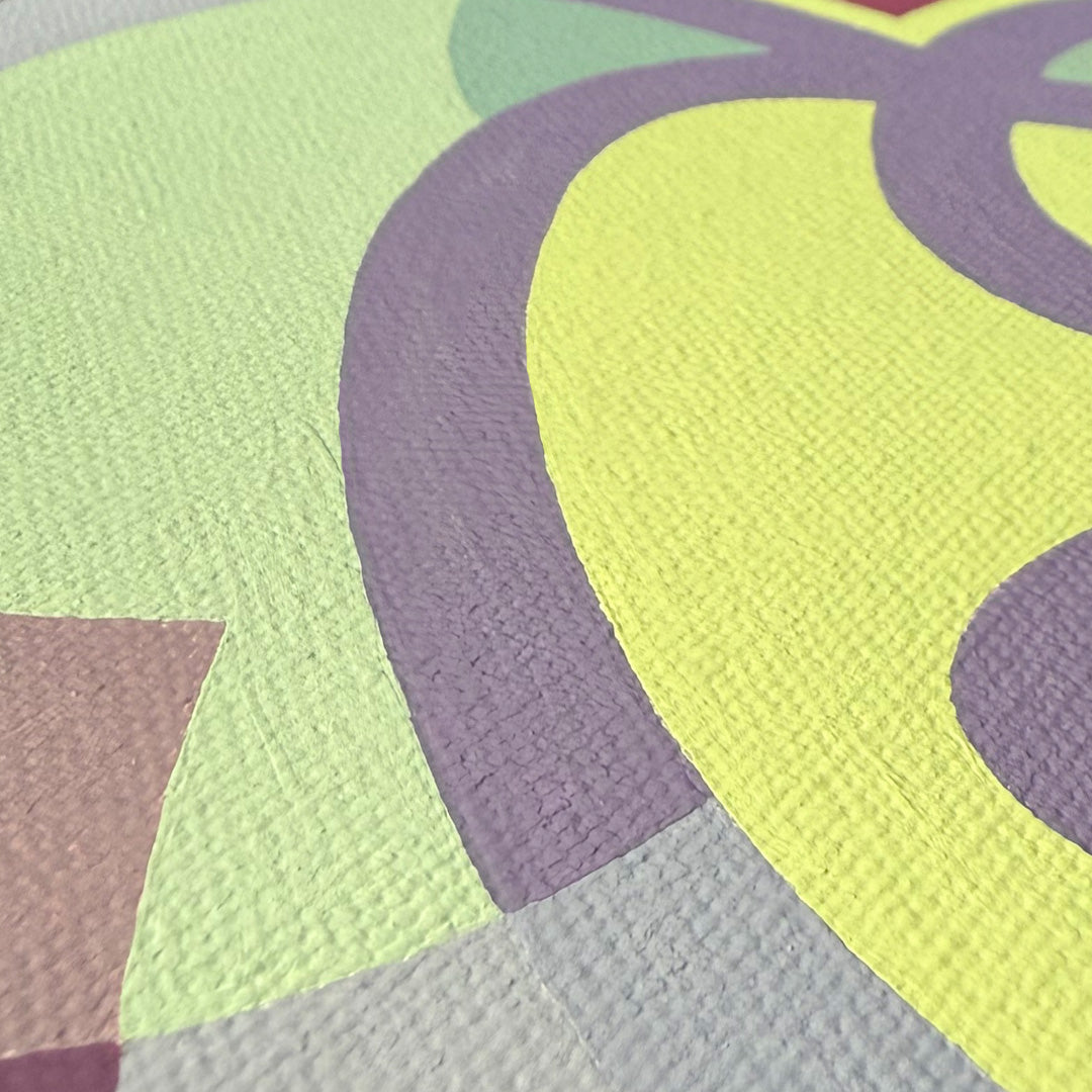 Close-up of a colorful modern canvas painting with organic colorful overlaying shapes