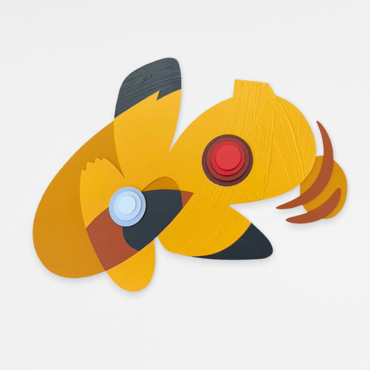 Handcrafted abstract pikachu wood wall sculpture with layered red geometric forms and textured yellow and black details. Hanging on a white wall.