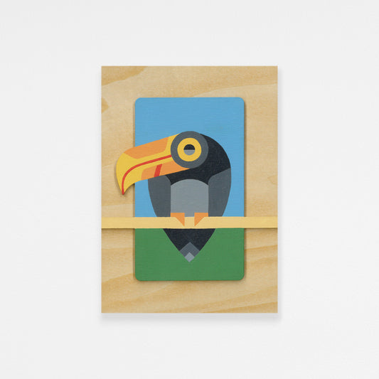 Wooden panel with a colorful, dimensional toucan painting featured against a white background